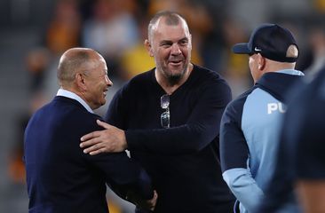Pumas coach Michael Cheika (C) shakes hands with Wallabies Coach Eddie Jones prior to The Rugby Championship match between the Wallabies and Argentina.