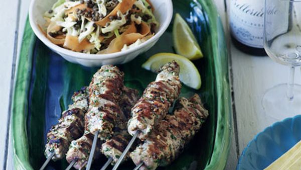 Barbecued pork and coriander kebabs with cabbage, carrot and lentil salad