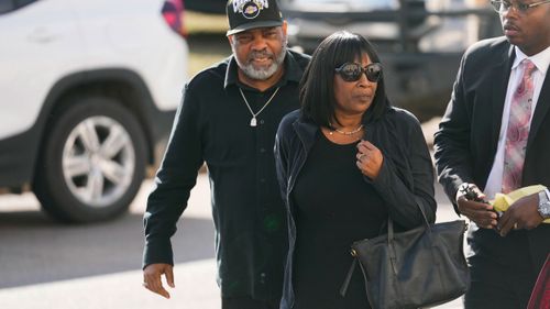 RowVaughn Wells, mother of Tyre Nichols, who died after being beaten by Memphis police officers, arrives at a news conference with Tyre's stepfather Rodney Wells, left, in Memphis.