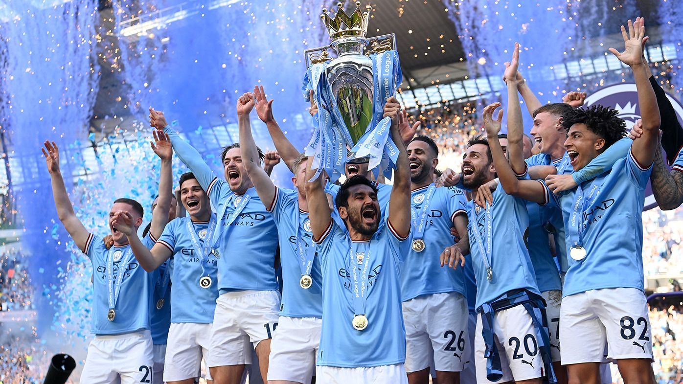 Ilkay Guendogan of Manchester City lifts the Premier League trophy following the Premier League match between Manchester City and Chelsea FC at Etihad Stadium on May 21, 2023 in Manchester, England. (Photo by Michael Regan/Getty Images)