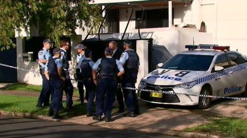 A man has been hit by two bullets after being shot at as he reversed out of his Sydney driveway. (9NEWS)