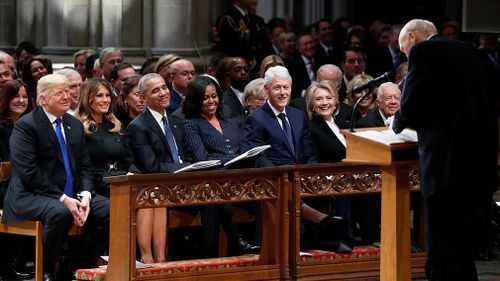 US President Donald Trump, pictured at the earlier funeral in Washington with the array of previous presidents, was the apparent target of some of the speeches.