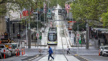 A general view of trams and pedestrians at Bourke Street Mall in Melbourne.