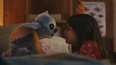 (L-R) Stitch and Maia Kealoha as Lilo in Disneys live-action LILO & STITCH. Photo courtesy of Disney. © 2025 Disney Enterprises Inc. All Rights Reserved.