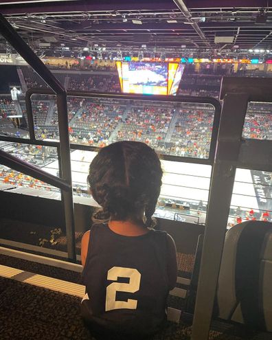 Vanessa Bryant with daughters Bianka and Capri at WNBA game in Las Vegas.