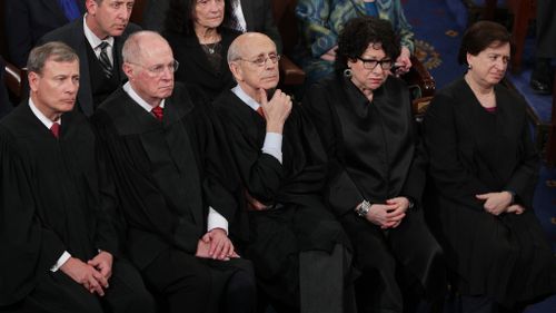 Supreme Court Chief Justice John Roberts, Supreme Court Associate Justice Anthony Kennedy, Supreme Court Associate Justice Stephen Breyer, Supreme Court Associate Justice Sonia Sotomayor and Supreme Court Associate Justice Elena Kagan look on. (AFP)