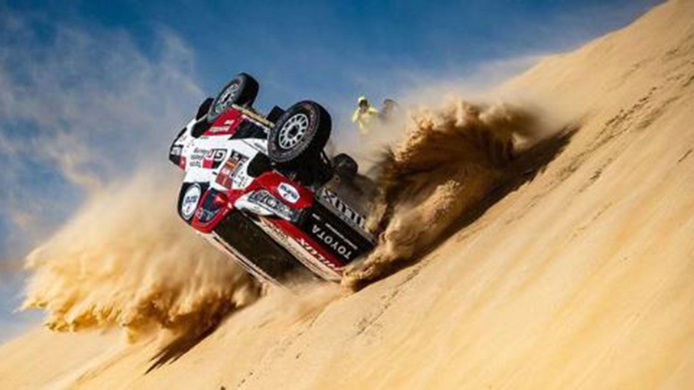 Fernando Alonso crashes during the Dakar Rally.