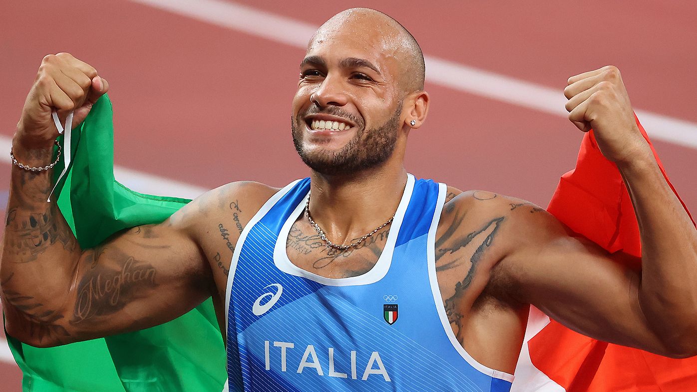 Lamont Marcell Jacobs of Team Italy celebrates after winning gold in the Men&#x27;s 100m Final