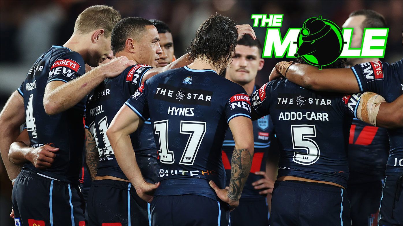 NSW Blues come together on the field after losing State of Origin I.