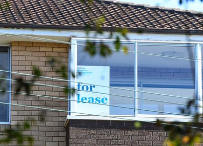 A for lease sign in a window.