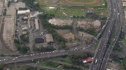 The chemical spill has sparked major traffic delays as James Ruse Drive closes shuts both lanes. 