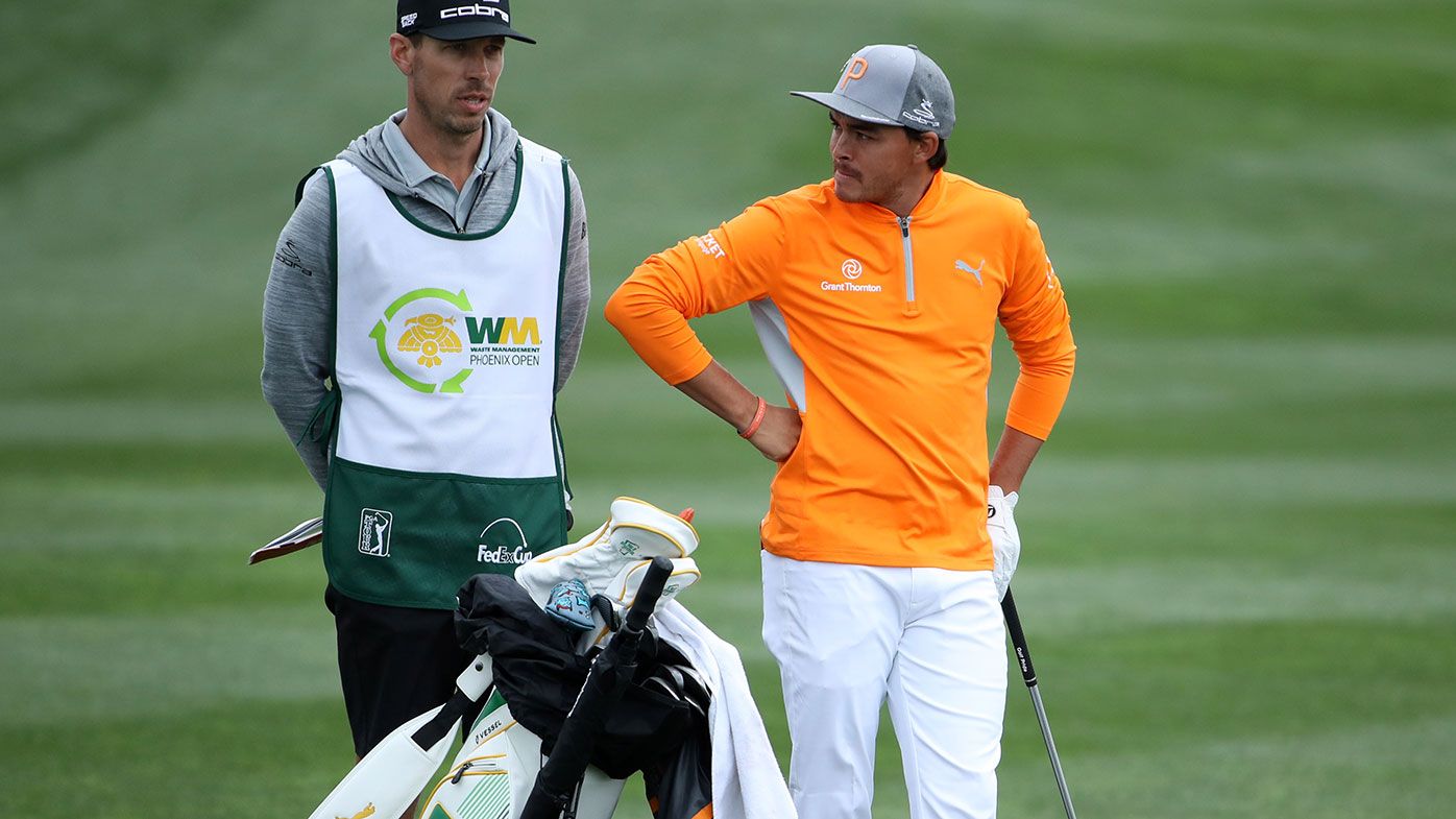 Rickie Fowler and his caddie during the final round of the Phoenix Open.
