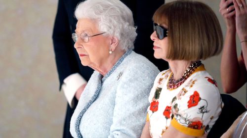 Queen Elizabeth II attends the Richard Quinn show in London. (Getty)