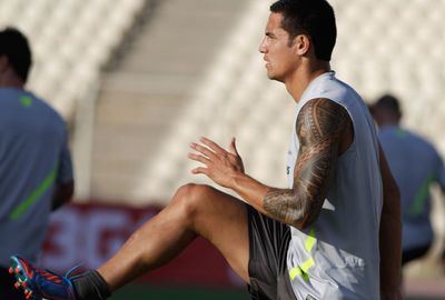 When it comes to the round ball, Tim Cahill's tatts are a standout for the Socceroos. (Getty)