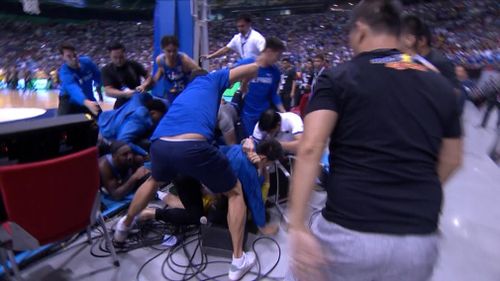 The fight then pushed into the crowd, where Goulding found himself under a pack of around 10 Filipino players and staff. Picture: Fox News