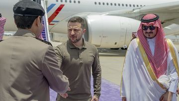 Ukraine&#x27;s President Volodymyr Zelenskyy is greeted by Prince Badr Bin Sultan, deputy governor of Mecca, right, upon his arrival at Jeddah airport, Saudi Arabia, Friday, May 19, 2023.