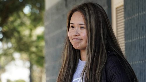 Fonda Quan, niece of ballrooom shooting victim Mymy Nhan, talks about her aunt while speaking to media outlets in Rosemead, California on Monday.