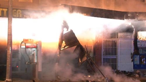 The explosion ripped through the front of the store. (9NEWS)