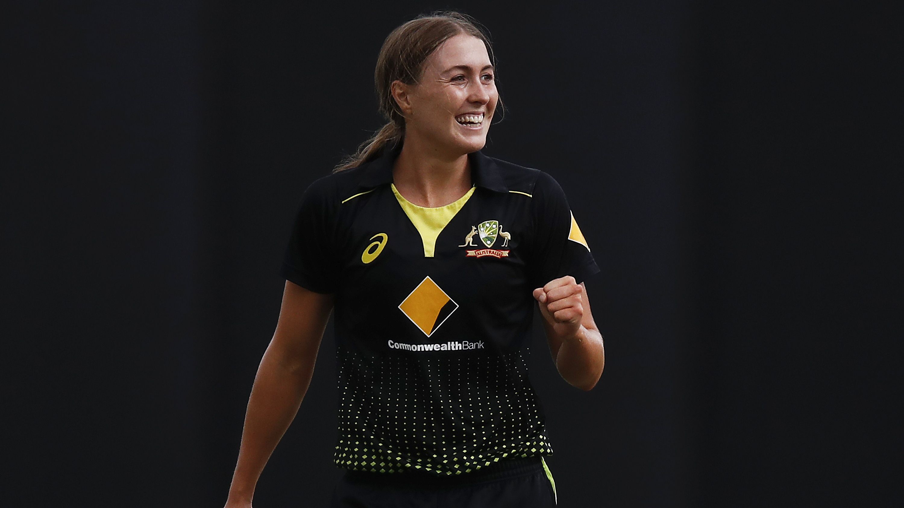 Tayla Vlaeminck of Australia celebrates after taking a wicket.