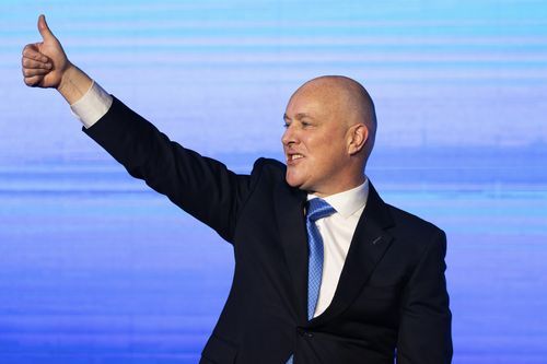 New Zealand National Party leader and Prime Minister elect Christopher Luxon gestures to supporters at a party event in Auckland, Saturday, Oct. 14, 2023, following a general election. 