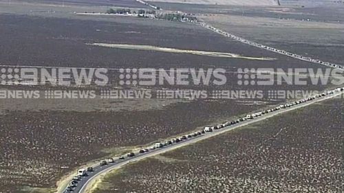 The intersection of the Copper Coast Highway and National Highway 1 heading south from the Yorke Peninsula is packed with cars.