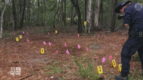 Police at the Gympie property after the death of Bruce Saunders.