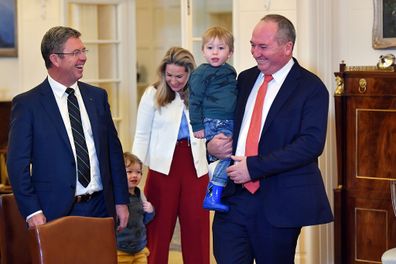 Barnaby Joyce holding son