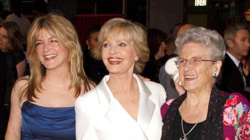 Susan Olsen (left), with Florence Henderson (centre) and Ann B. Davis (righ...