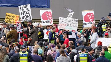 Protesters gather outside Parliament House in Melbourne, Sunday, May 10, 2020. Anti-vaxxers and Victorians fed up with the coronavirus lockdown have broken social distancing rules to protest in Melbourne&#x27;s CBD on Mother&#x27;s Day.