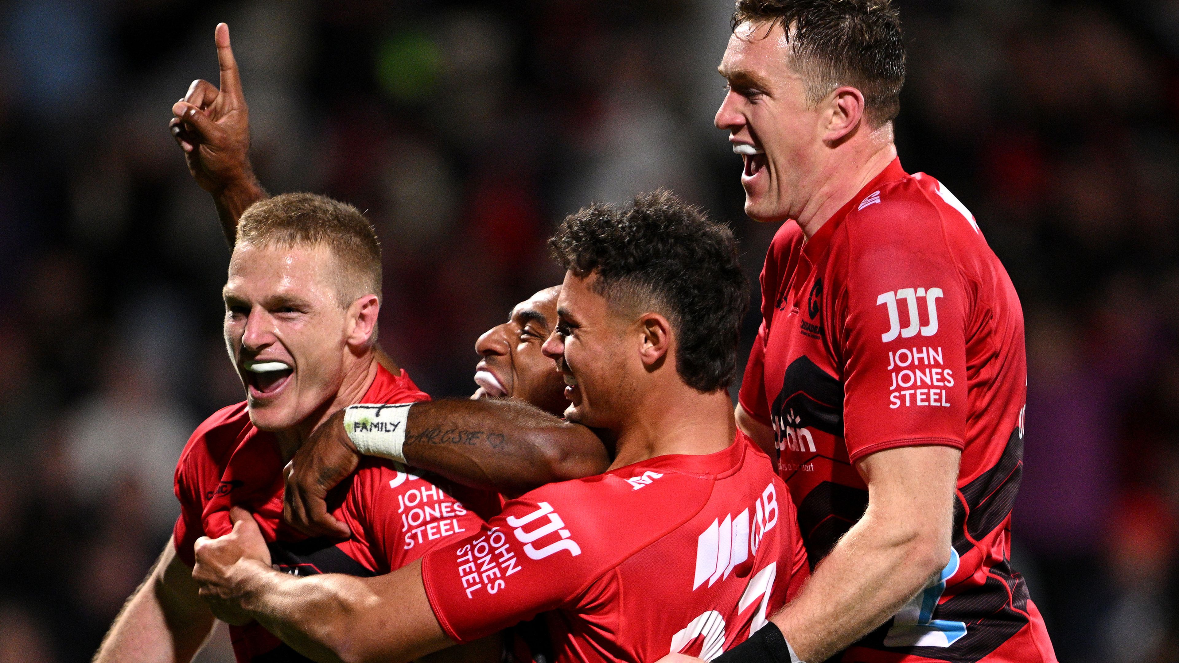 Johnny McNicholl of the Crusaders celebrates after scoring a try during the round six Super Rugby Pacific.
