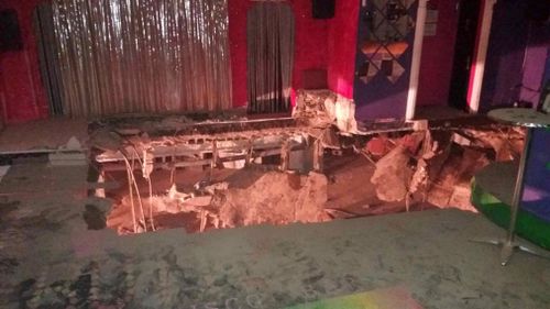 Part of the night club dance floor collapsed into the basement, injuring 22. (AAP)