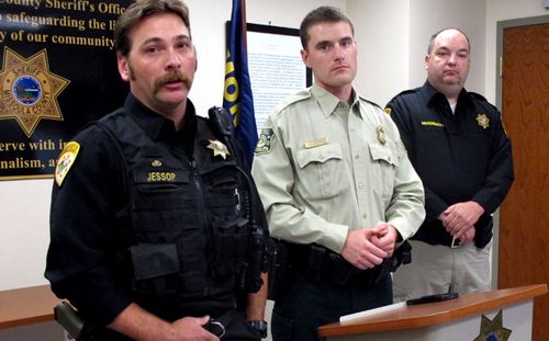 Missoula County Sheriff's From left: Deputy Ross Jessop, US Forest Service Law Enforcement Officer Nick Scholz and Sheriff T.J. McDermott. (Photo: AP). 