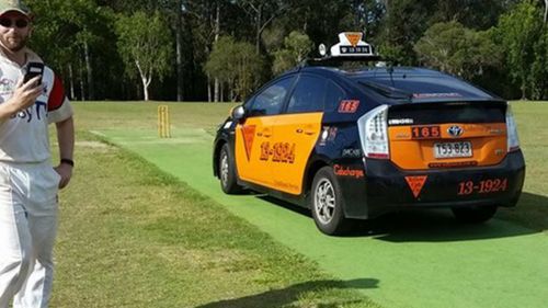 Irate cabbie drives onto Brisbane cricket pitch after ball hits taxi