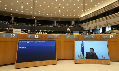 Ukraine's President Volodymyr Zelenskyy addresses the Plenary, via remote link, during an extraordinary session on Ukraine at the European Parliament in Brussels, Tuesday, March 1, 2022