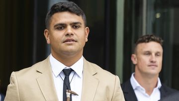 Latrell Mitchell and Jack Wighton depart ACT Magistrates Court in Canberra on Wednesday.