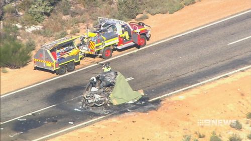 The car was hit after a truck blew a tyre and crossed to the wrong side of the road. (9NEWS)