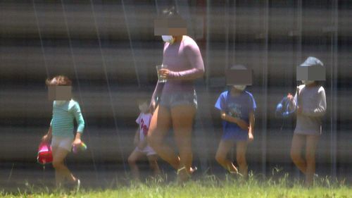 A family in quarantine on Christmas Island.