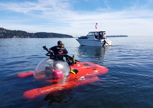 An Aquatica submarine prepares for a dive. The submarines will be armed with powerful lighting and sonar to explore the Blue Hole.