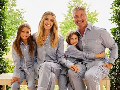 Kate Waterhouse, Luke Ricketson and their daughters Sophia (left) and Grace (right).