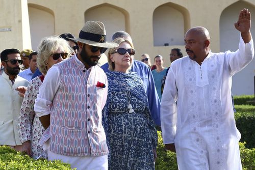 Former US Presidential candidate Hillary Clinton sprained her hand when she tripped and fell down some stairs during a visit to India last week. (AAP)