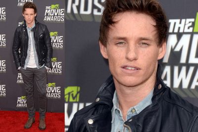 English actor Eddie Redmayne is leather jacket cool on the red carpet.