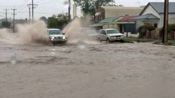 Broken Hill inundated with month&#x27;s worth of rain in 15 minutes.