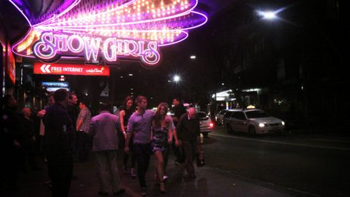 Sydney's notorious Kings Cross party strip will have its pub lockout regulations lifted for one night only. (AAP)