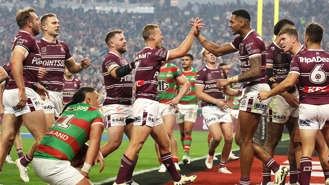 Daly Cherry-Evans celebrates a try with Jason Saab during Manly&#x27;s win over the Rabbitohs in Vegas.