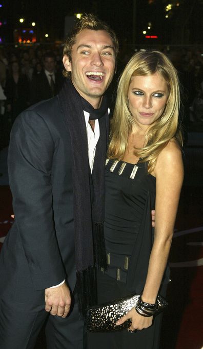 Actors Jude Law and Sienna Miller arrive at the World Premiere of Alfie at the Empire Leicester Square on October 14, 2004 in London. 