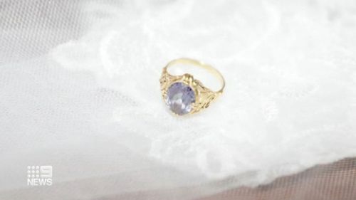 The ring has an intricate gold band, with a pink diamond, and was worn by Jing on her wedding day. 