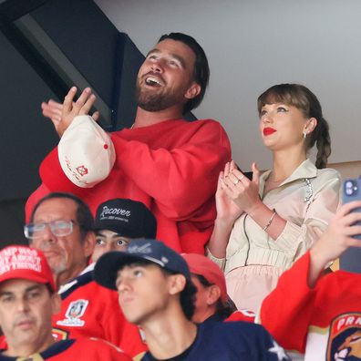 SUNRISE, FLORIDA - JUNE 12: Travis Kelce, left, and Taylor Swift react as the Edmonton Oilers and the Florida Panthers play during the first period in Game Four of the 2025 Stanley Cup Final at Amerant Bank Arena on June 12, 2025 in Sunrise, Florida. (Photo by Bruce Bennett/Getty Images)