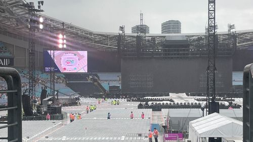 Taylor Swift's first Sydney show has been delayed as storms loom over Accor Stadium.