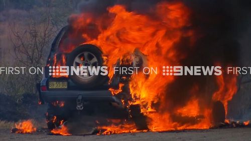 The car burst into flames on the Princes Motorway near Helensburgh. (9NEWS)