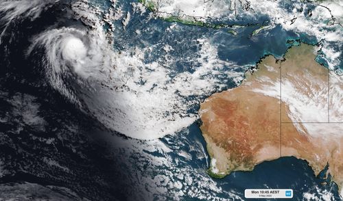 The sun rises over Tropical Cyclone Karim on Monday morning.